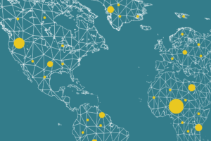 World map with varying sizes of yellow dots